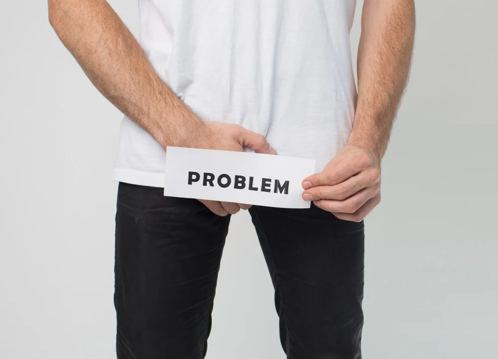 O que é Disfunção Erétil e quais os tratamentos? 4 cut view male body legs jeans having problem urinal problem disease can t pee well suffer from pain